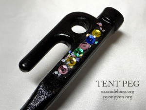tent peg with sequins